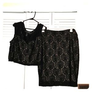 Skirt / shirt outfit.